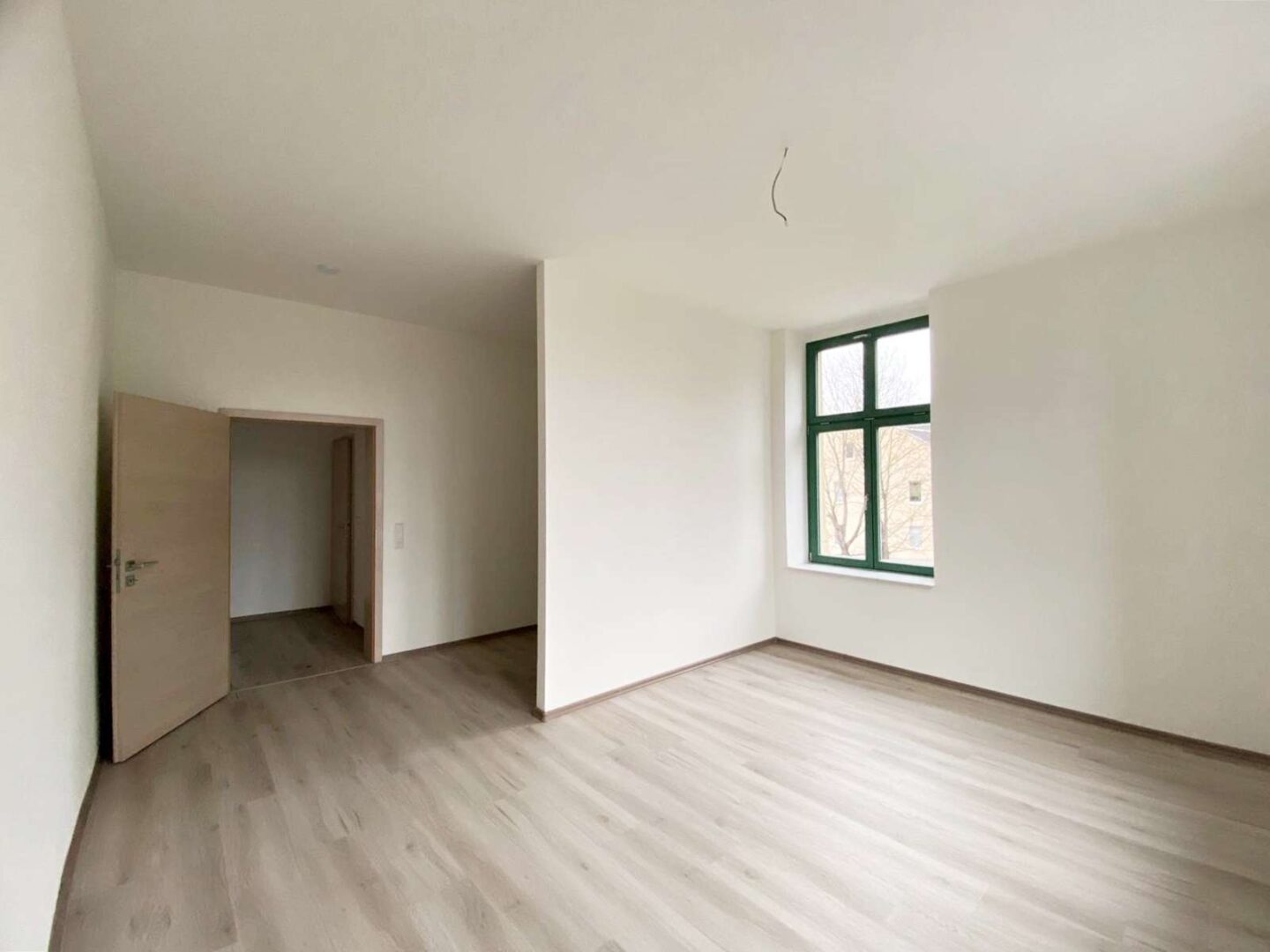 Schlafzimmer mit Ankleideraum